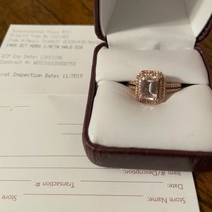14K Rose gold and Morganite ring with diamond halo.